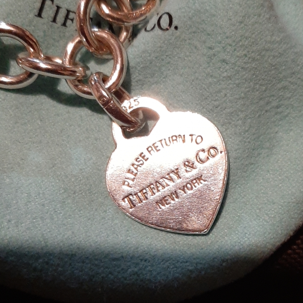 Tiffany &Co. Heart tag charm and bracelet.
